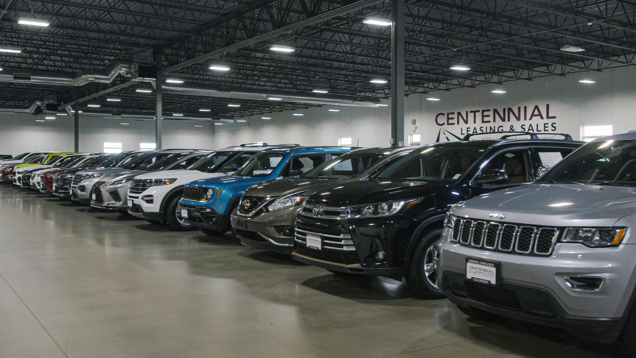 Gallery floor of car buying service in Denver